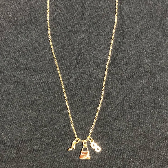coach charm necklace